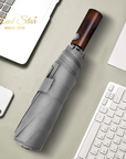 Paraguas automático con mango de madera – Elegancia y protección para todos los días